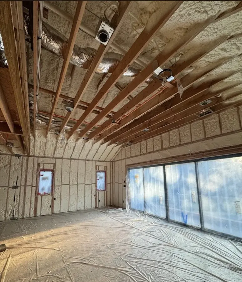 Interior walls and ceiling insulated with spray foam during new construction in Owings Mills